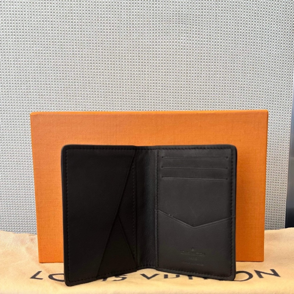 Authentic Louis Vuitton black calfskin rare pocket organizer Pristine!